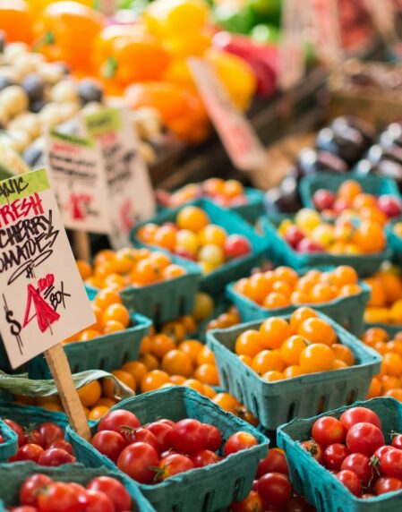 red tomato lot on blue baskets